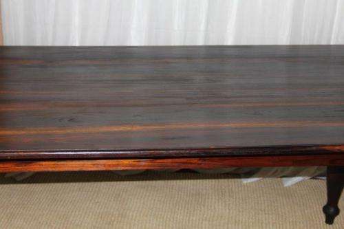 A SPECTACULAR SOLID STINKWOOD 6 TO 8-SEATER DINING TABLE WITH SOLID TURNED LEGS IN AWESOME CONDITION