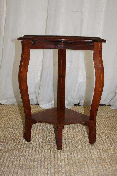 AN AWESOME SOLID TEAK COFFEE TABLE NEST WITH FOUR SMALLER TABLES MAKING A SINGLE LARGER ROUND TABLE