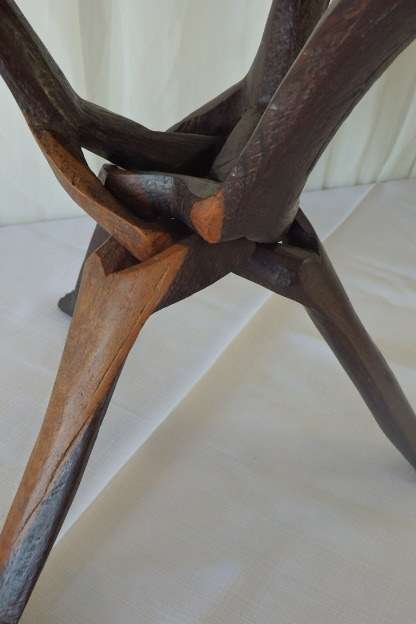 An awesome hand carved African blackwood bowl on a carved tripod stand