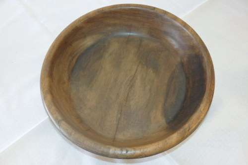 An awesome hand carved African blackwood bowl on a carved tripod stand
