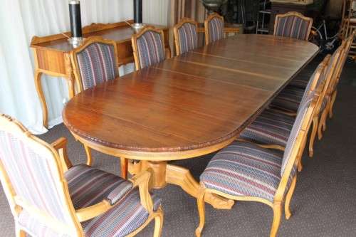A SPECTACULAR HAND CARVED BURMESE TEAK 10-SEATER DININGROOM SUITE w/ EXTENDING TABLE & CARVER CHAIRS