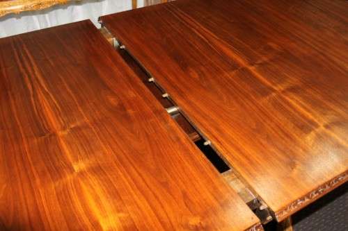 A SPECTACULAR HAND CARVED BURMESE TEAK 10-SEATER DININGROOM SUITE w/ EXTENDING TABLE & CARVER CHAIRS