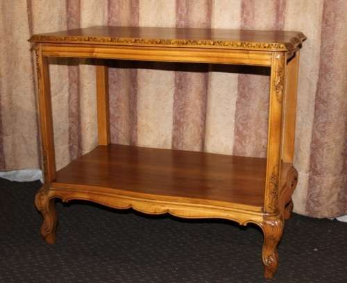 A FANTASTIC BURMESE TEAK DOUBLE SHELF SERVING HATCH TABLE WITH AMAZING HAND CARVED DETAILING