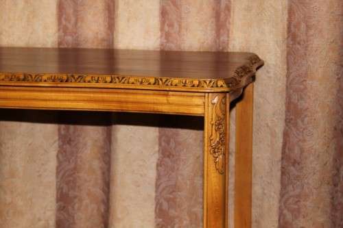 A FANTASTIC BURMESE TEAK DOUBLE SHELF SERVING HATCH TABLE WITH AMAZING HAND CARVED DETAILING
