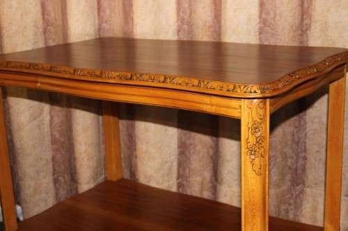 A FANTASTIC BURMESE TEAK DOUBLE SHELF SERVING HATCH TABLE WITH AMAZING HAND CARVED DETAILING