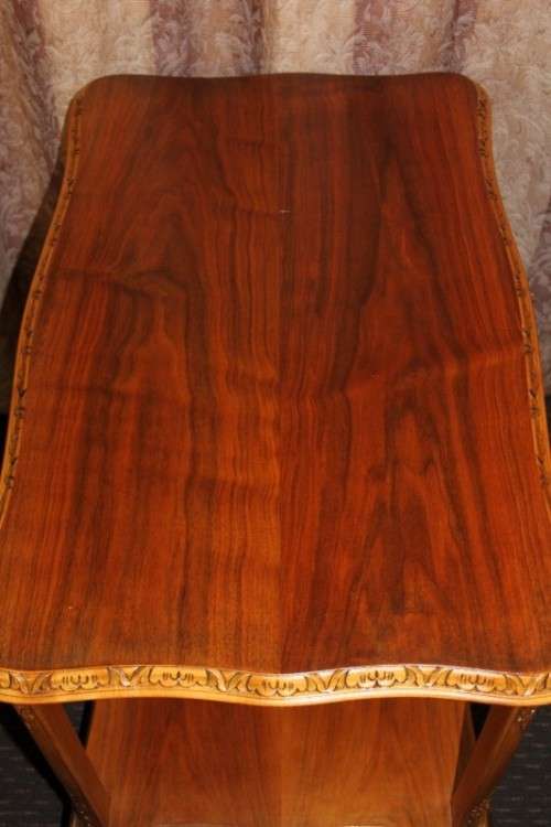 A FANTASTIC BURMESE TEAK DOUBLE SHELF SERVING HATCH TABLE WITH AMAZING HAND CARVED DETAILING