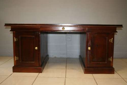 A STUNNING LARGE INDONESIAN TEAK EXECUTIVE "PARTNER" DESK WITH BRASS HANDLES AND HINGES