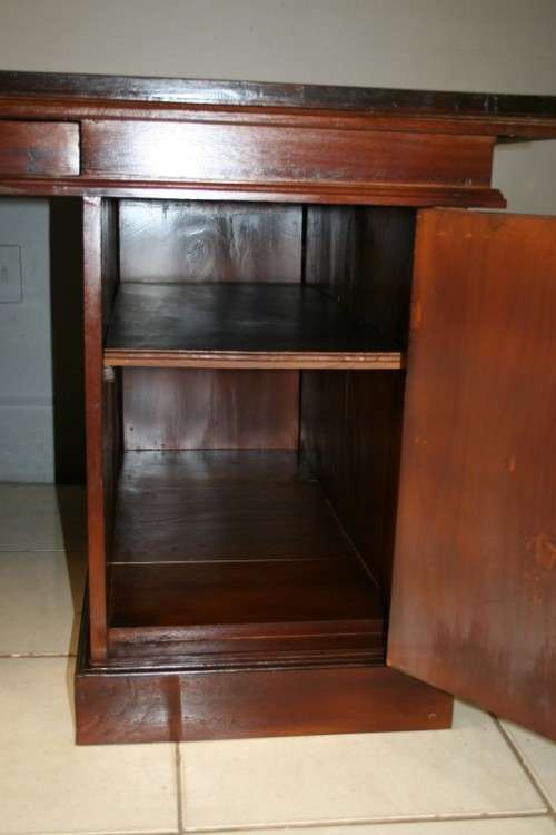 A STUNNING LARGE INDONESIAN TEAK EXECUTIVE "PARTNER" DESK WITH BRASS HANDLES AND HINGES