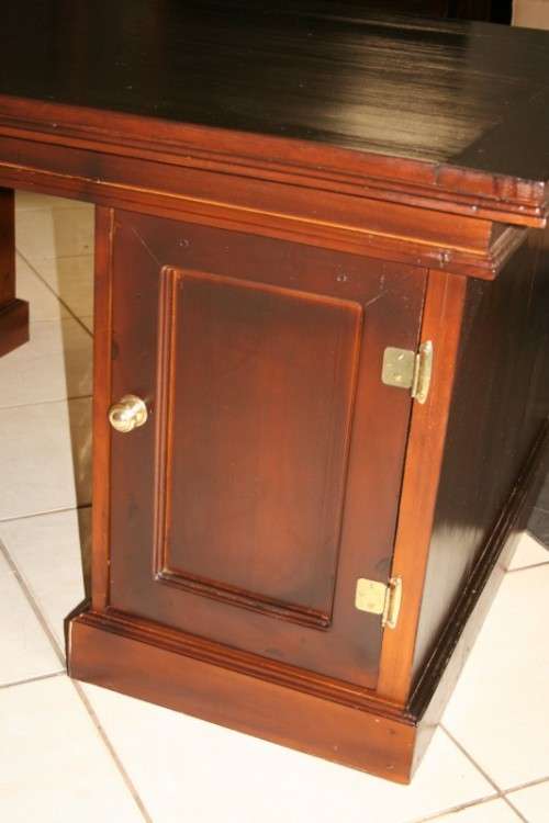 A STUNNING LARGE INDONESIAN TEAK EXECUTIVE "PARTNER" DESK WITH BRASS HANDLES AND HINGES