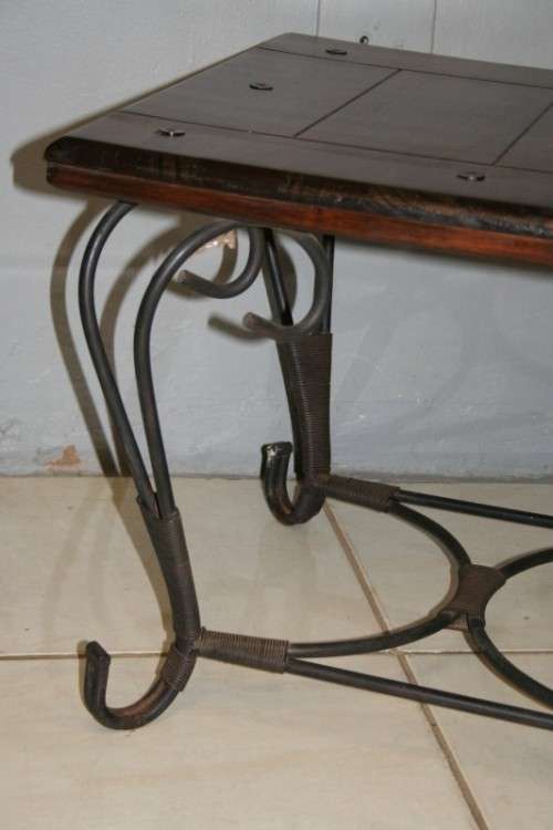TWO FANTASTIC AND VERY WELL MADE WROUGHT IRON AND INDONESIAN TEAK COFFEE TABLE bid/table