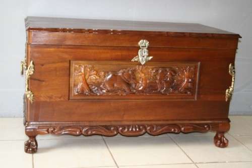 A SPECTACULAR LARGE ANTIQUE SOLID STINKWOOD WOODEN KIST WITH HEAVY BRASS EMBELLISHMENTS