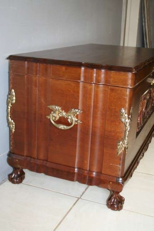 A SPECTACULAR LARGE ANTIQUE SOLID STINKWOOD WOODEN KIST WITH HEAVY BRASS EMBELLISHMENTS