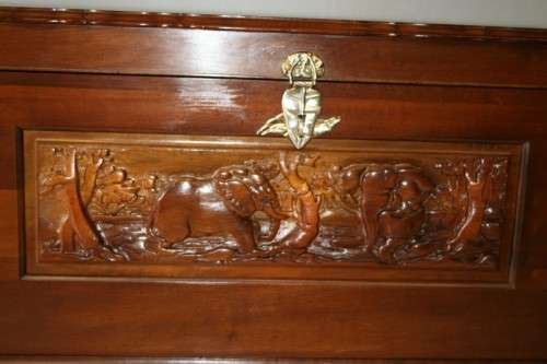 A SPECTACULAR LARGE ANTIQUE SOLID STINKWOOD WOODEN KIST WITH HEAVY BRASS EMBELLISHMENTS