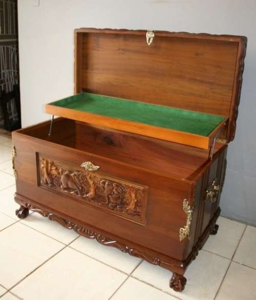 A SPECTACULAR LARGE ANTIQUE SOLID STINKWOOD WOODEN KIST WITH HEAVY BRASS EMBELLISHMENTS