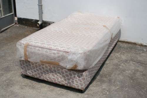 AN AWESOME SABS APPROVED "REST ASSURED" YORK ORTHOPEDIC SINGLE BED MATTRESS AND BASE SET