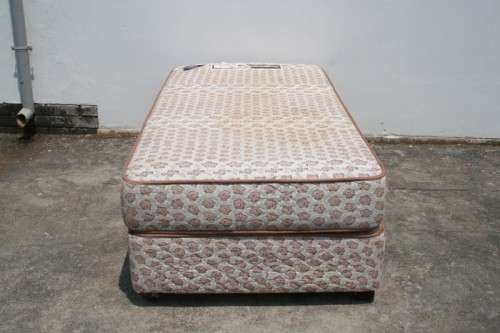 AN AWESOME SABS APPROVED "REST ASSURED" YORK ORTHOPEDIC SINGLE BED MATTRESS AND BASE SET