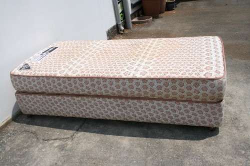 AN AWESOME SABS APPROVED "REST ASSURED" YORK ORTHOPEDIC SINGLE BED MATTRESS AND BASE SET