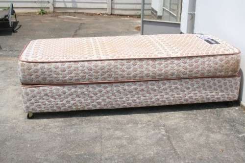 AN AWESOME SABS APPROVED "REST ASSURED" YORK ORTHOPEDIC SINGLE BED MATTRESS AND BASE SET