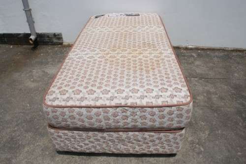AN AWESOME SABS APPROVED "REST ASSURED" YORK ORTHOPEDIC SINGLE BED MATTRESS AND BASE SET