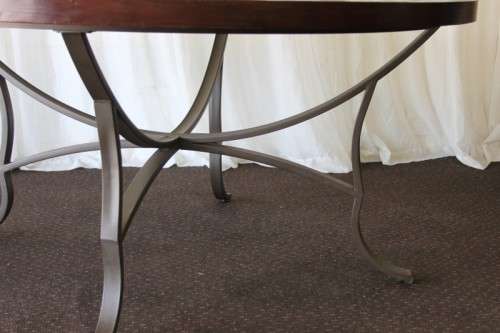 A SPECTACULAR (LARGE) ROUND 6-SEATER PATIO TABLE WITH A BEVELED GLASS TOP AND AMAZING DETAILING