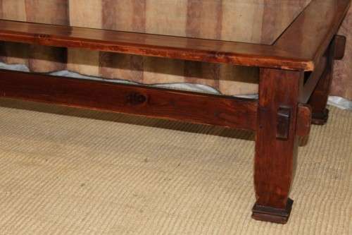An exquisitely made solid wooden centre coffee/ occasional table with a toughened glass top RS17