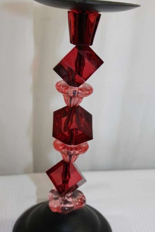 AN AWESOME TALL "MODERN" BLACK METAL CANDLE HOLDER WITH A PINK AND RED BEADED STEM