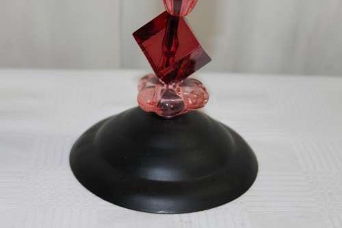 AN AWESOME TALL "MODERN" BLACK METAL CANDLE HOLDER WITH A PINK AND RED BEADED STEM