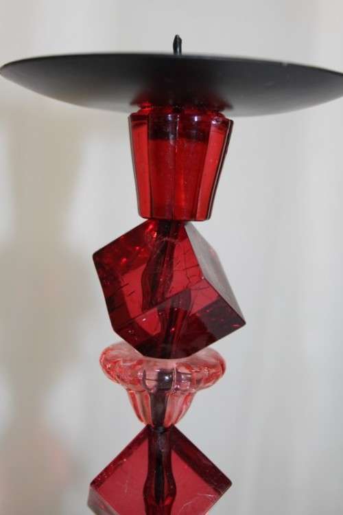 AN AWESOME TALL "MODERN" BLACK METAL CANDLE HOLDER WITH A PINK AND RED BEADED STEM