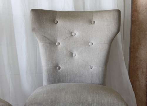 TWO AWESOME MODERN UPHOLSTERED ARC-BACK CHAIRS WITH BUTTON DETAILING bid/chair