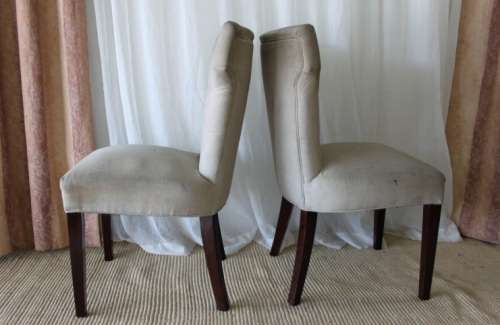TWO AWESOME MODERN UPHOLSTERED ARC-BACK CHAIRS WITH BUTTON DETAILING bid/chair