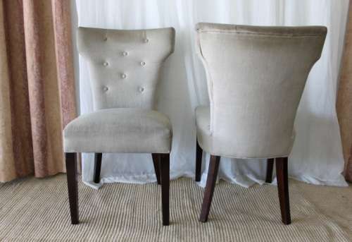 TWO AWESOME MODERN UPHOLSTERED ARC-BACK CHAIRS WITH BUTTON DETAILING bid/chair