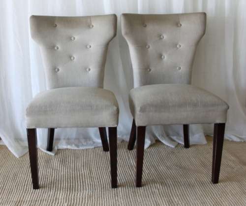 TWO AWESOME MODERN UPHOLSTERED ARC-BACK CHAIRS WITH BUTTON DETAILING bid/chair