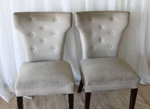 TWO AWESOME MODERN UPHOLSTERED ARC-BACK CHAIRS WITH BUTTON DETAILING bid/chair