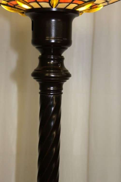 A SUPERBLY DETAILED 1.8m TALL ANTIQUE ART NOUVEAU CAST IRON FLOOR LAMP WITH A STAINED GLASS SHADE