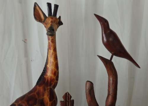 A STUNNING **JOB LOT** OF ASSORTED WOODEN CARVINGS INCLUDING A GENUINE TEAK ELEPHANT WOODEN CARVING