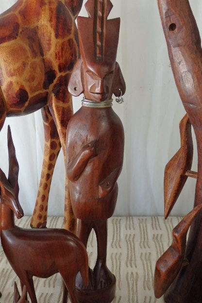 A STUNNING **JOB LOT** OF ASSORTED WOODEN CARVINGS INCLUDING A GENUINE TEAK ELEPHANT WOODEN CARVING
