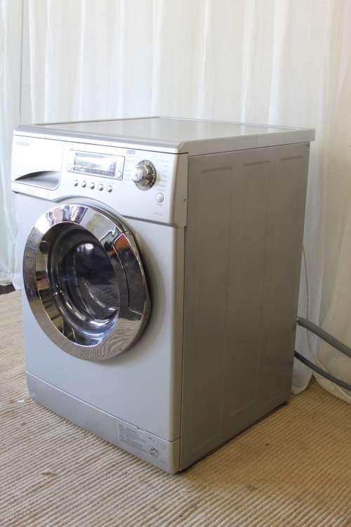 A SUPERB SILVER SAMSUNG (WD-J1255R) ELECTRONIC FRONT LOADER WASHING MACHINE AND TUMBLE DRYER COMBO