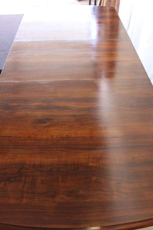 A STUNNING VINTAGE 6 TO 8 SEATER EXTENDABLE DINING TABLE WITH A "HIDDEN" EXTENSION COMPARTMENT