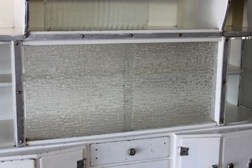 AN INCREDIBLE VINTAGE KITCHEN CUPBOARD WITH CURVED GLASS PANELS AND LOADS OF SPACE
