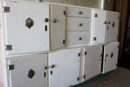 AN INCREDIBLE VINTAGE KITCHEN CUPBOARD WITH CURVED GLASS PANELS AND LOADS OF SPACE
