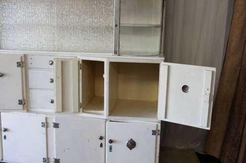 AN INCREDIBLE VINTAGE KITCHEN CUPBOARD WITH CURVED GLASS PANELS AND LOADS OF SPACE