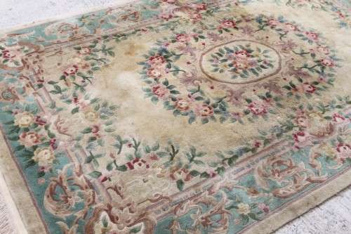 A WONDERFUL ANTIQUE PURE WOOL PILE CARPET (2.9m x 1.8m) WITH GREENS, PINKS, TANS AND EARTHY TONES