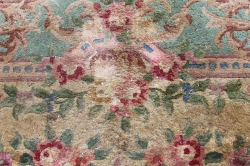 A WONDERFUL ANTIQUE PURE WOOL PILE CARPET (2.9m x 1.8m) WITH GREENS, PINKS, TANS AND EARTHY TONES