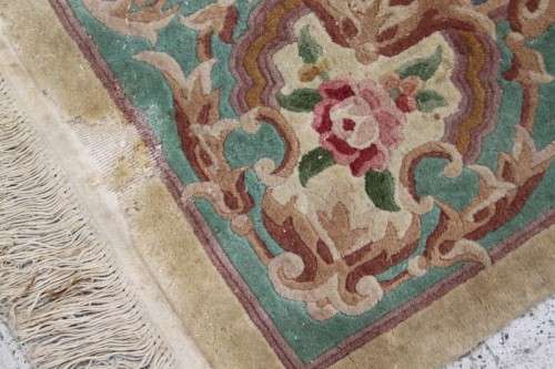 A WONDERFUL ANTIQUE PURE WOOL PILE CARPET (2.9m x 1.8m) WITH GREENS, PINKS, TANS AND EARTHY TONES
