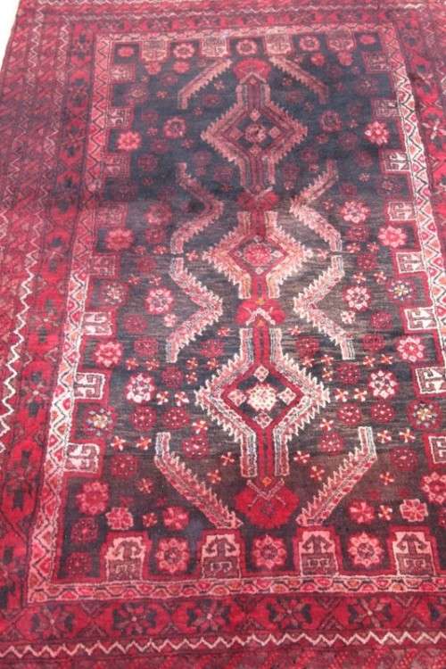 A GORGEOUS VINTAGE PERSIAN "AFGHAN" CARPET (2m x 1.1m) WITH A TRADITIONAL DEEP RED COLOURS & STYLING