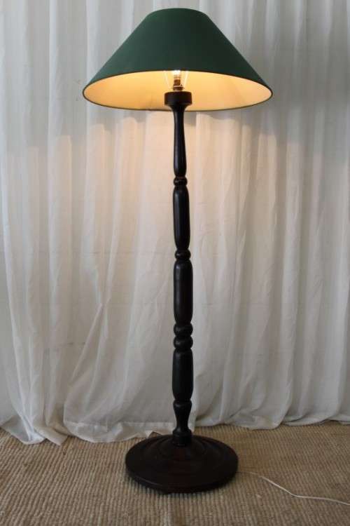 An exquisite tall solid African Black wood floor lamp with a large shade in awesome condition
