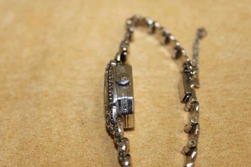 A STUNNING & RARE VINTAGE ART DECO MARCASITE ADORNED SWISS MADE "HUGUENIN" LADIES COCKTAIL WATCH