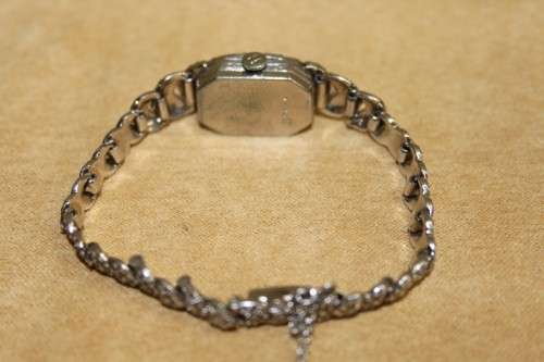 A STUNNING & RARE VINTAGE ART DECO MARCASITE ADORNED SWISS MADE "HUGUENIN" LADIES COCKTAIL WATCH