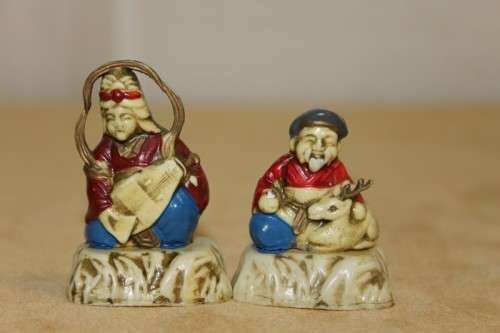 A WONDERFUL SET OF SEVEN "JAPANESE SEVEN LUCKY GODS" HAND PAINTED & NUMBERED BAKELITE FIGURINES
