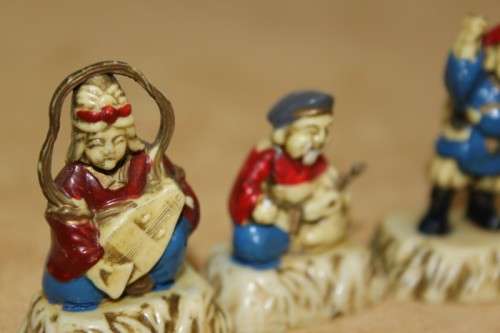 A WONDERFUL SET OF SEVEN "JAPANESE SEVEN LUCKY GODS" HAND PAINTED & NUMBERED BAKELITE FIGURINES